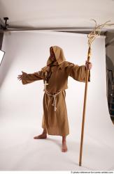 JOEL_ADAMSON STANDING POSE WITH A MAGIC STICK